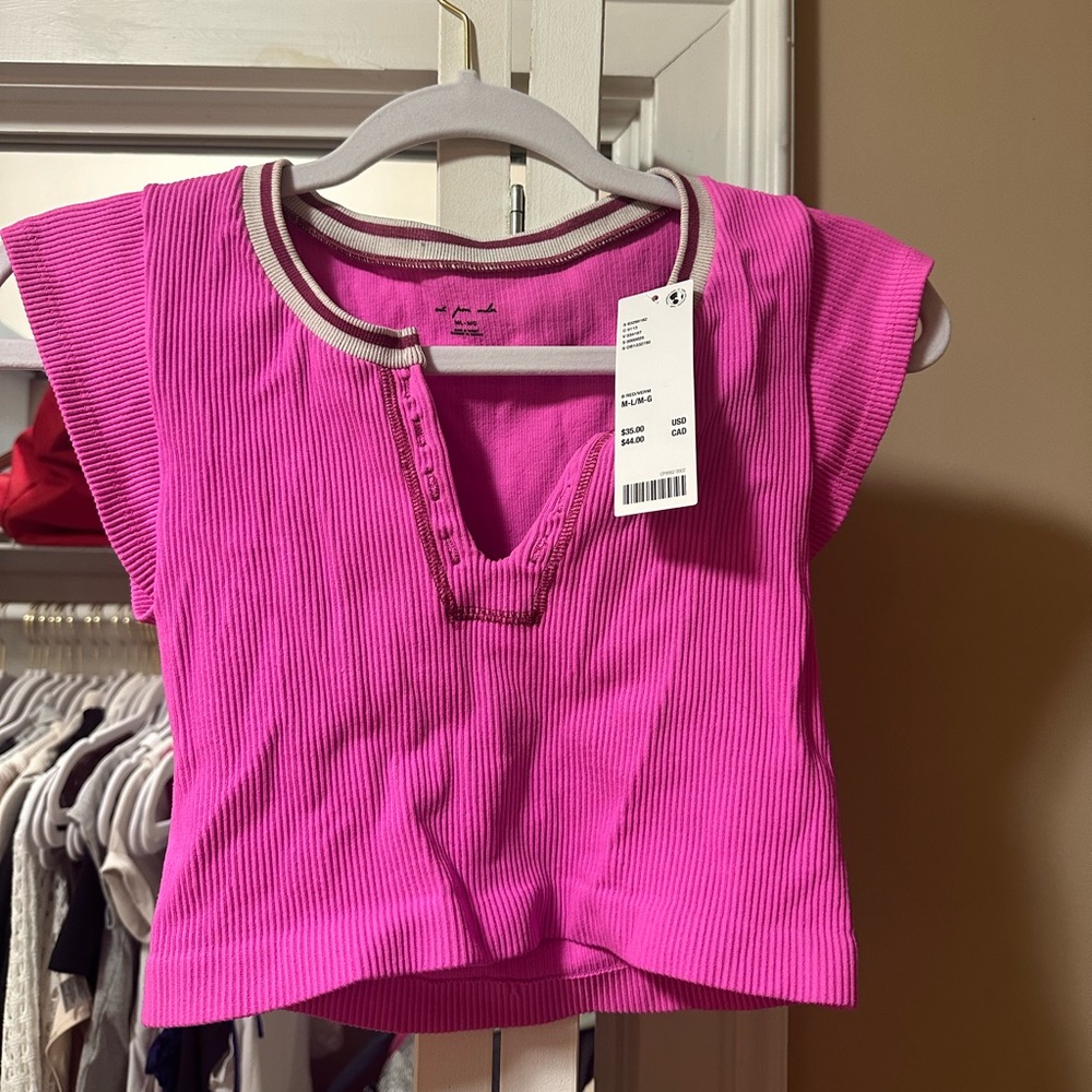 NWT never worn pink go for gold top from urban!!